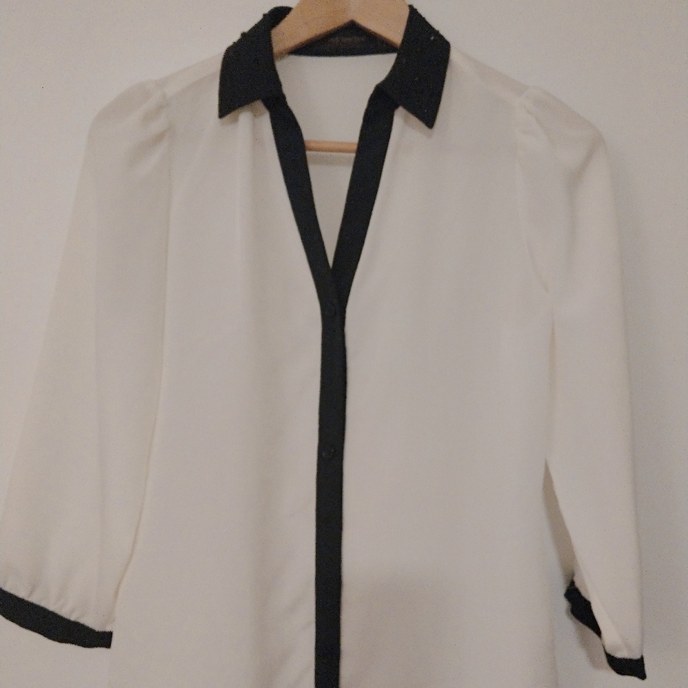 The limited black and white top